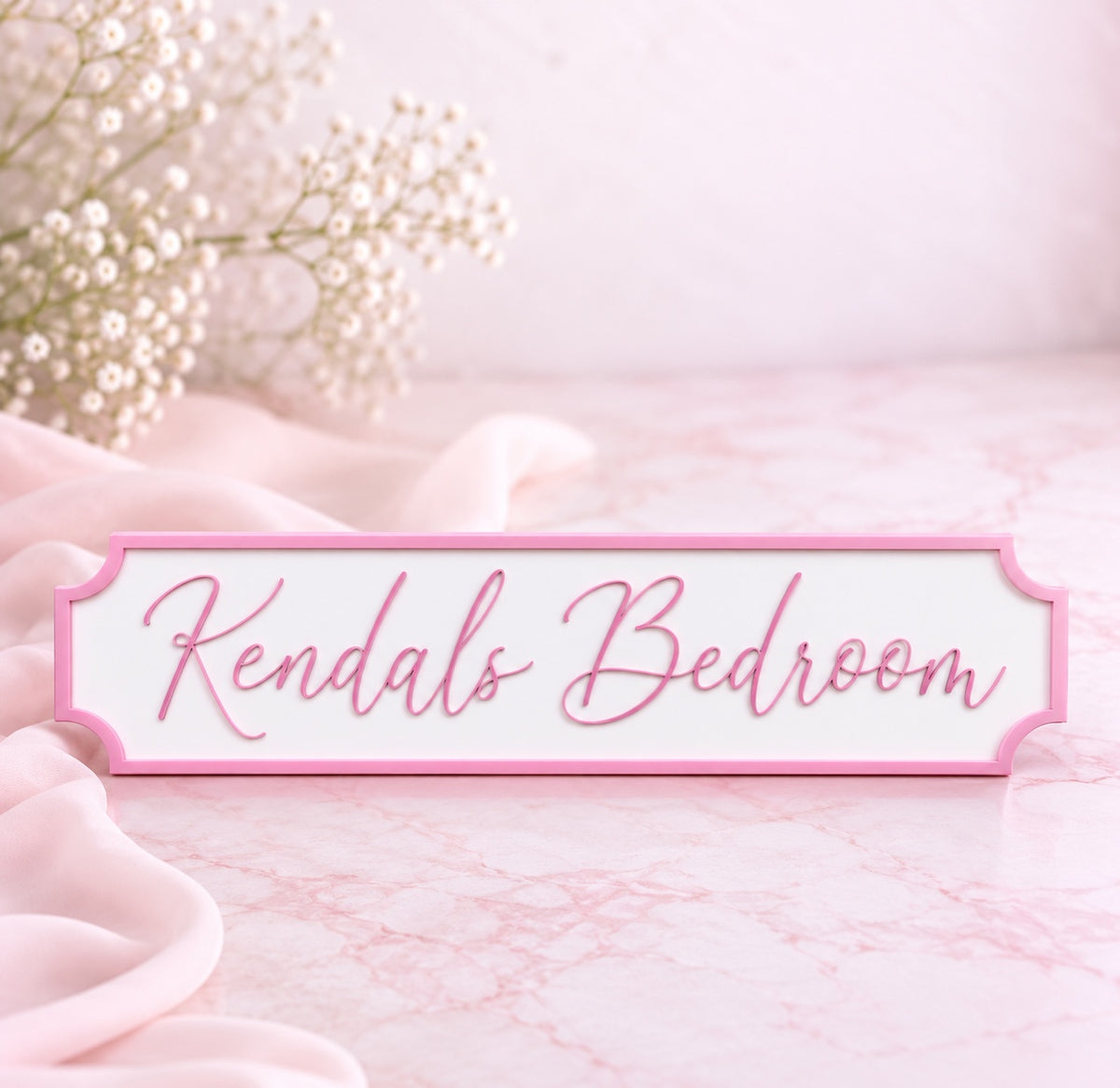 Acrylic bedroom door sign blank in baby pink – personalised example shown